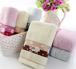 毛巾厂家直销 纯棉弱捻素色提小绵羊毛巾 吸水柔软图2