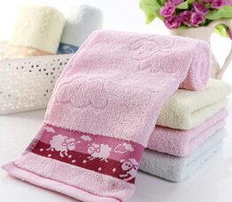 毛巾厂家直销 纯棉弱捻素色提小绵羊毛巾 吸水柔软图3