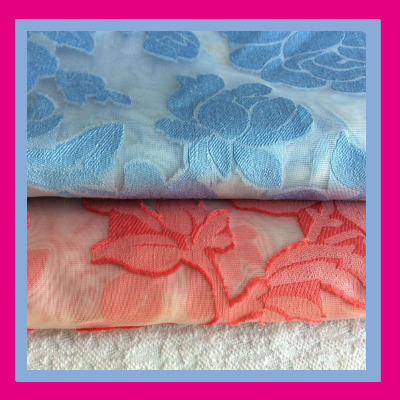 外单时尚服饰欧根纱提花布料 梭织剪花服装布料 新款时装面料