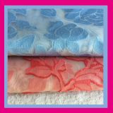 外单时尚服饰欧根纱提花布料 梭织剪花服装布料 新款时装面料